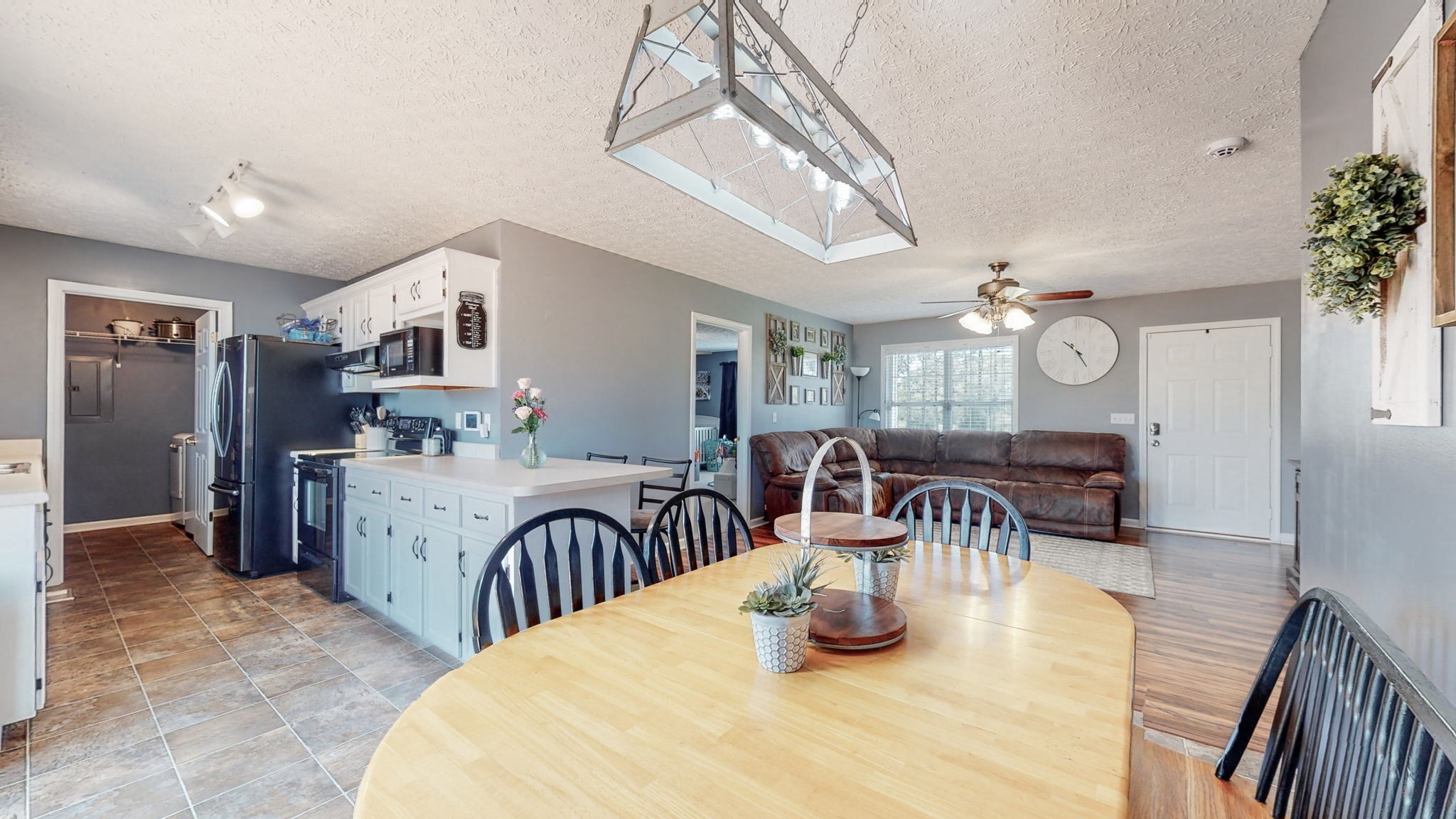 4321 Matthews Road Cedar Hill, TN 37032 - Photo 15 of 29 a kitchen with sink and refrigerator