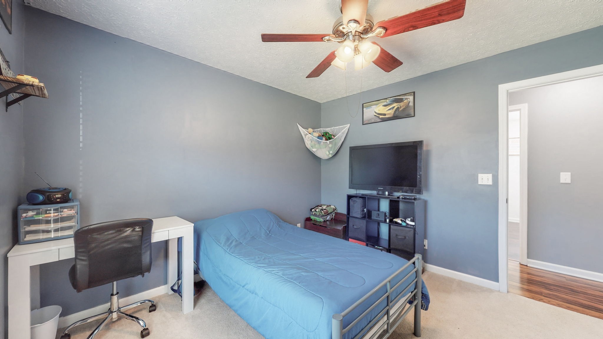 4321 Matthews Road Cedar Hill, TN 37032 - Photo 28 of 29 a room with furniture and a flat screen tv