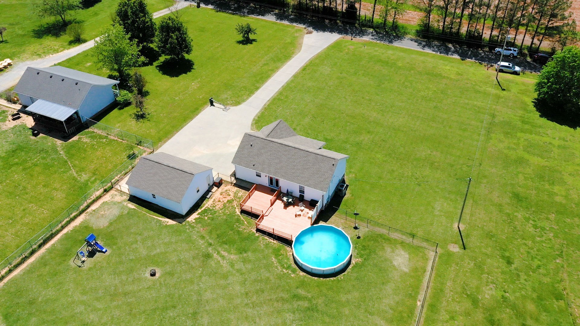 4321 Matthews Road Cedar Hill, TN 37032 - Photo 7 of 29 an aerial view of a house with a swimming pool