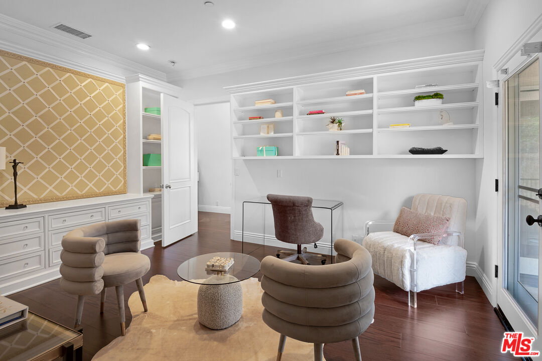 23575 Parksouth Street Calabasas, CA 91302 - Photo 29 of 75 a living room with furniture and a wooden floor