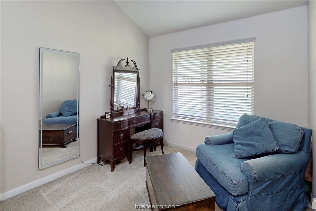 2071 Positano Loop Bryan, TX 77808 - Photo 15 of 31 a living room with furniture and a window