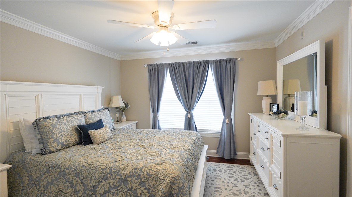 303 Lookover Drive Anderson, SC 29621 - Photo 22 of 46 This restful bedroom offers a perfect escape with elegant crown molding and ample natural light.