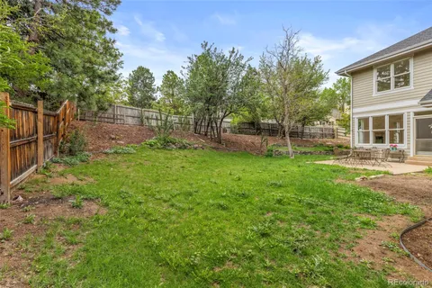 a view of a backyard with a garden