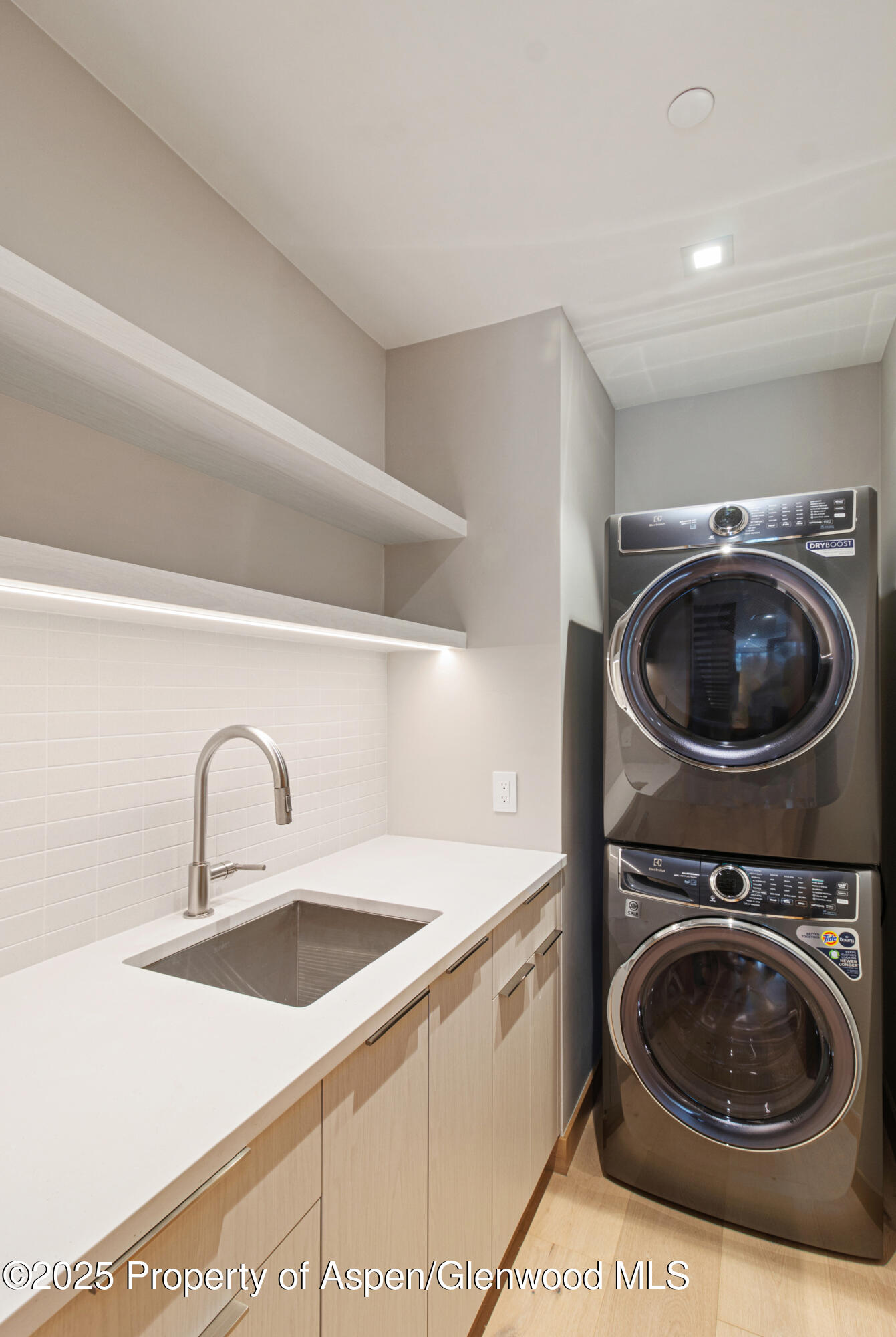 155 Lakeview Drive Basalt, CO 81621 - Photo 61 of 93 a utility room with sink dryer and washer