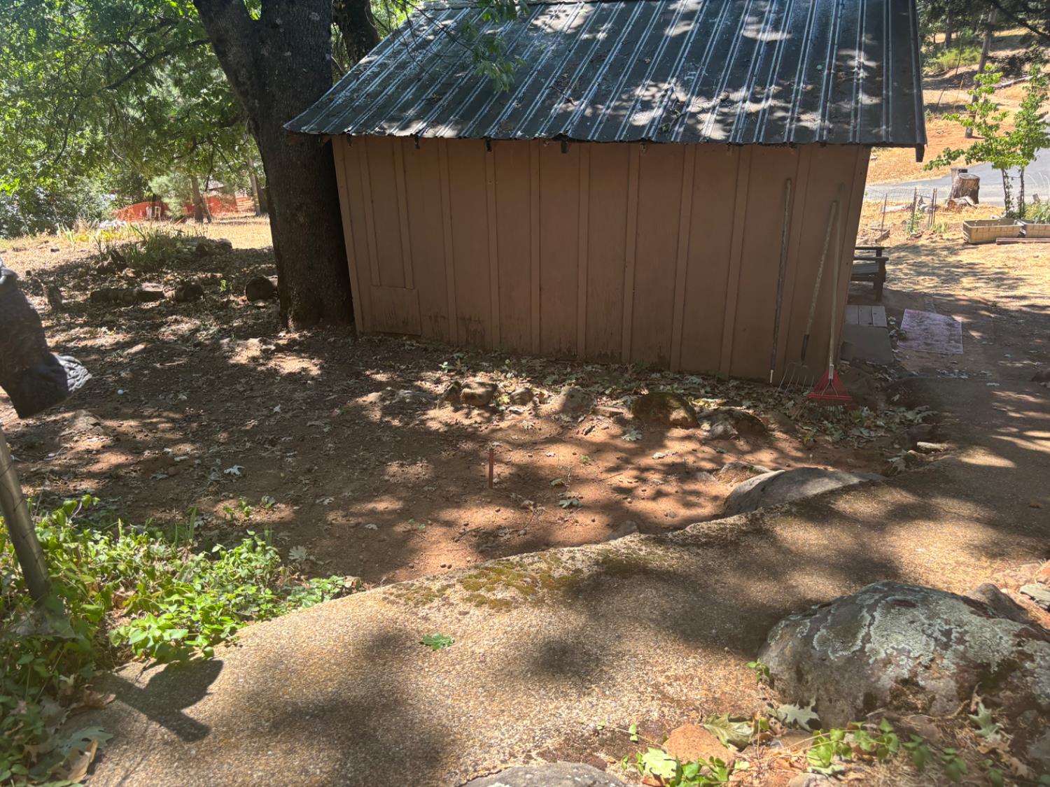 15574 Hinton Road Pioneer, CA 95666 - Photo 22 of 44 a view of a house with a yard