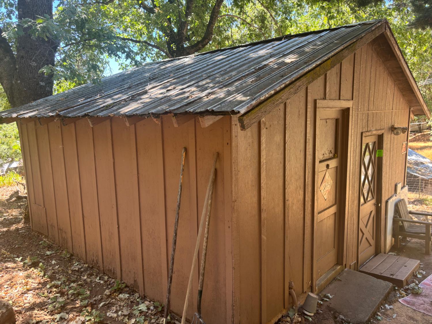 15574 Hinton Road Pioneer, CA 95666 - Photo 7 of 44 a view of a backyard with wooden fence