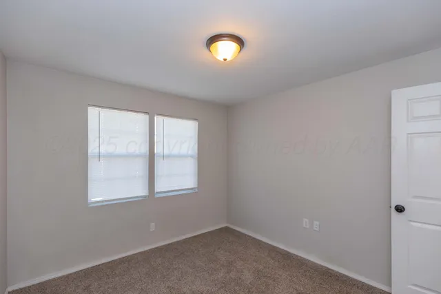 a view of a room with windows