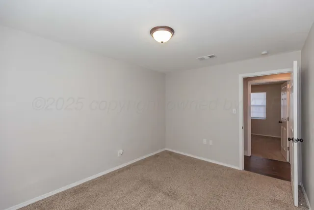 a view of empty room with window