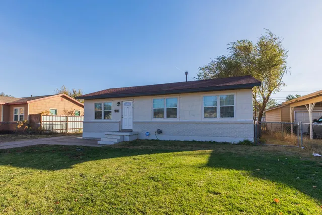 a view of a house with swimming pool