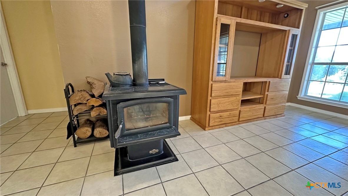 729 Armadillo Lane Kempner, TX 76539 - Photo 13 of 45 a living room with a chair and a table