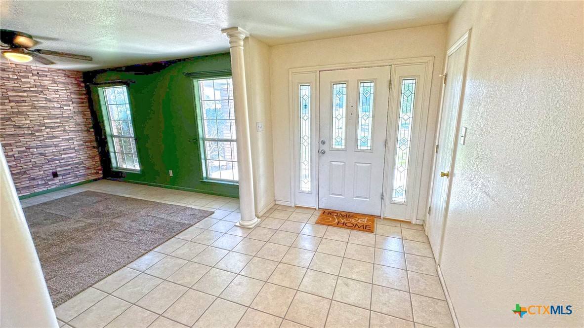 729 Armadillo Lane Kempner, TX 76539 - Photo 16 of 45 a view of an entryway with wooden floor