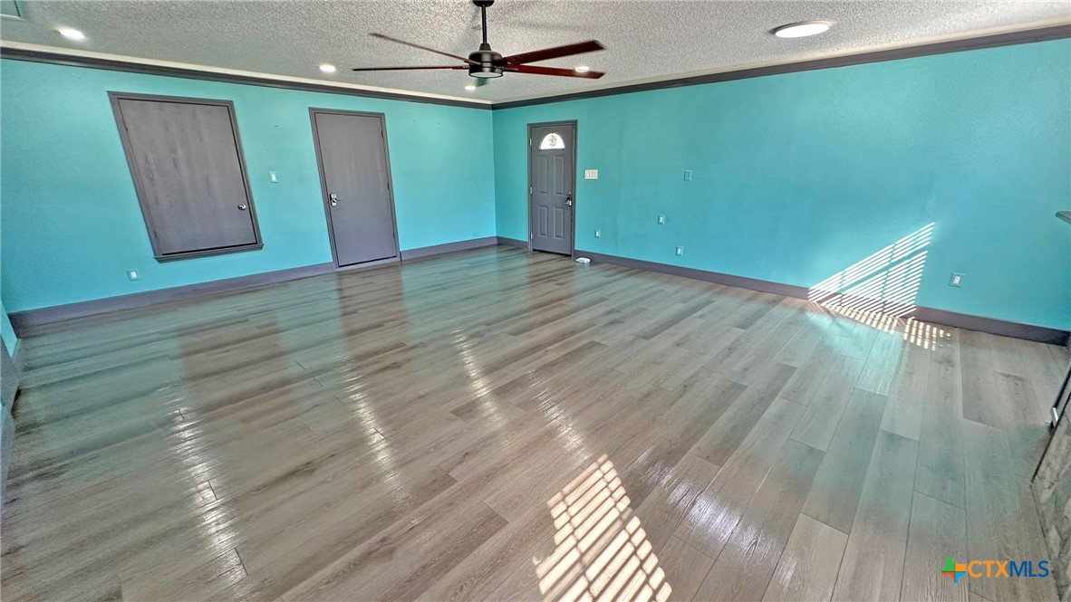 729 Armadillo Lane Kempner, TX 76539 - Photo 17 of 45 wooden floor in an empty room