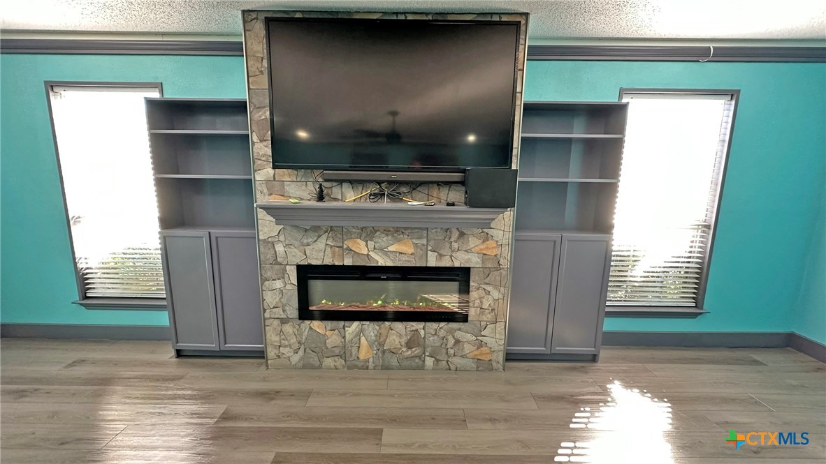 729 Armadillo Lane Kempner, TX 76539 - Photo 19 of 45 a living room with a fireplace