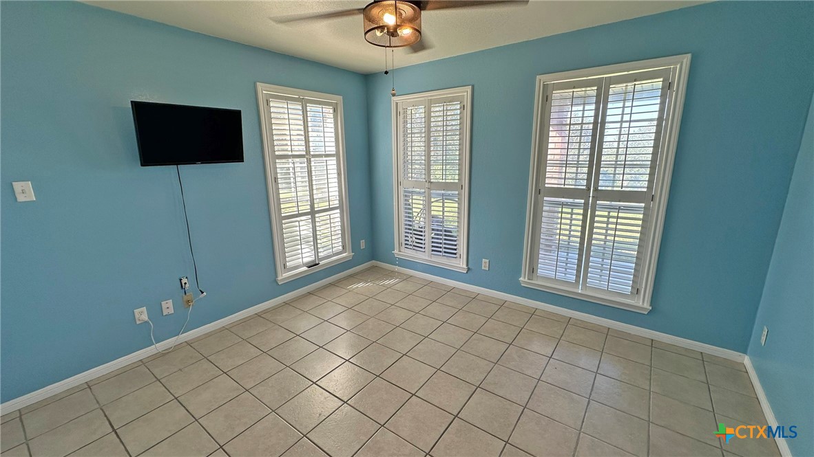 729 Armadillo Lane Kempner, TX 76539 - Photo 20 of 45 a view of an empty room with window and hardwood floor