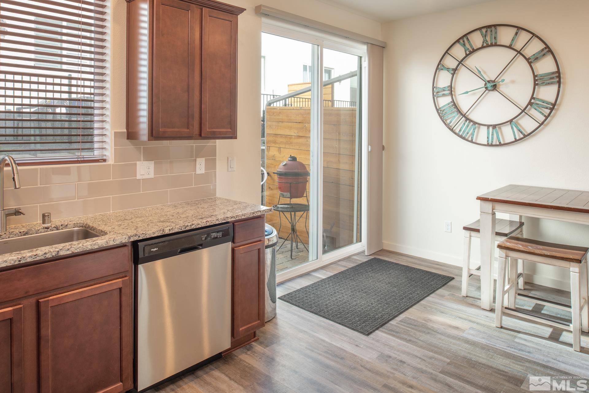 575 Logan Jacob Lane Reno, NV 89503 - Photo 11 of 31 an empty room with wooden floor and a window