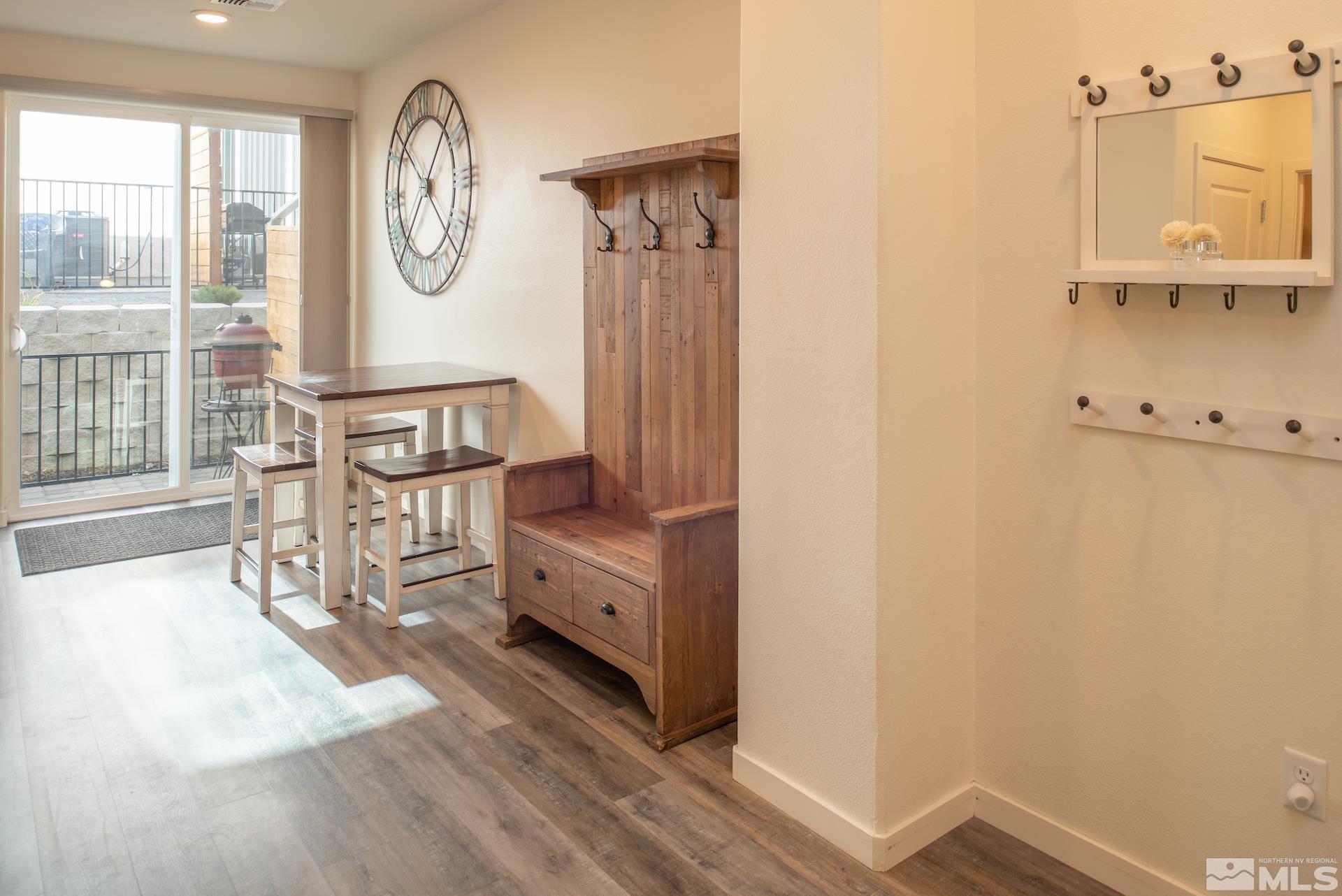 575 Logan Jacob Lane Reno, NV 89503 - Photo 12 of 31 a view of a hallway with wooden floor and a window