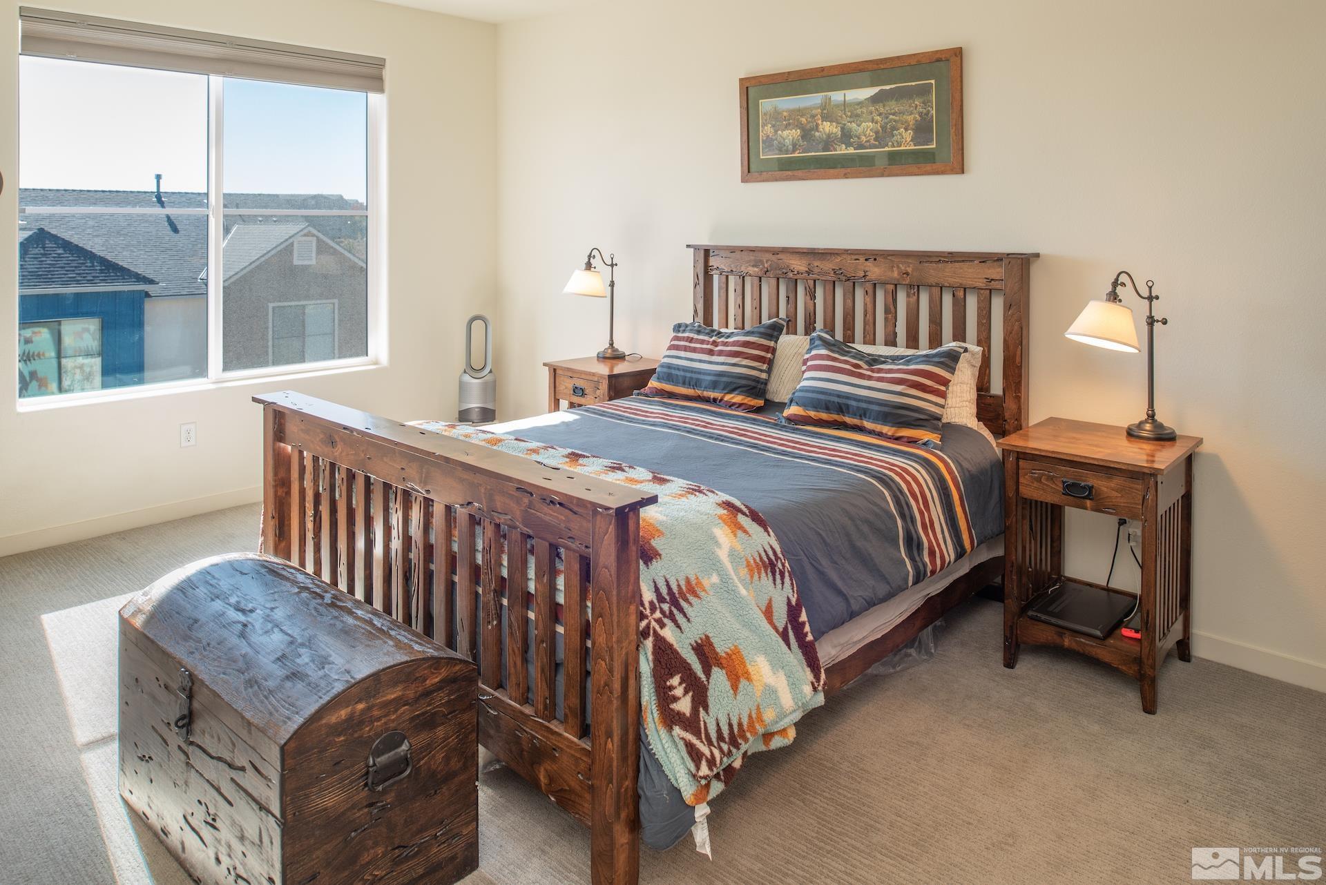 575 Logan Jacob Lane Reno, NV 89503 - Photo 15 of 31 a bedroom with a bed and a window