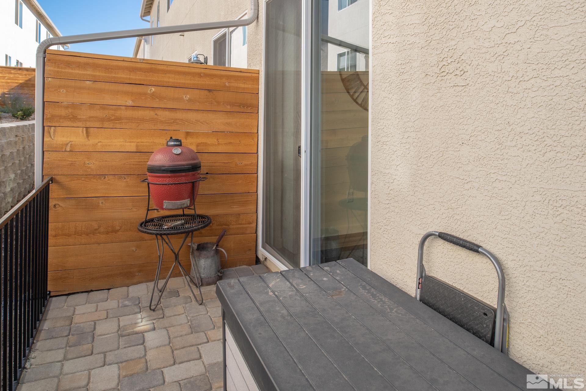 575 Logan Jacob Lane Reno, NV 89503 - Photo 22 of 31 a view of a door with a potted plant