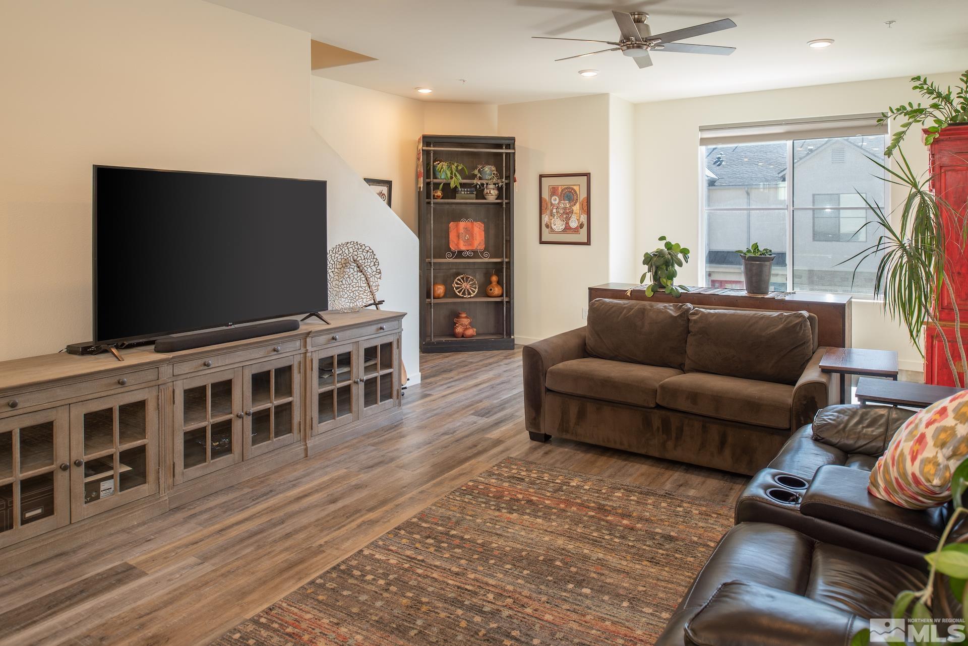 575 Logan Jacob Lane Reno, NV 89503 - Photo 5 of 31 a living room with furniture and a flat screen tv