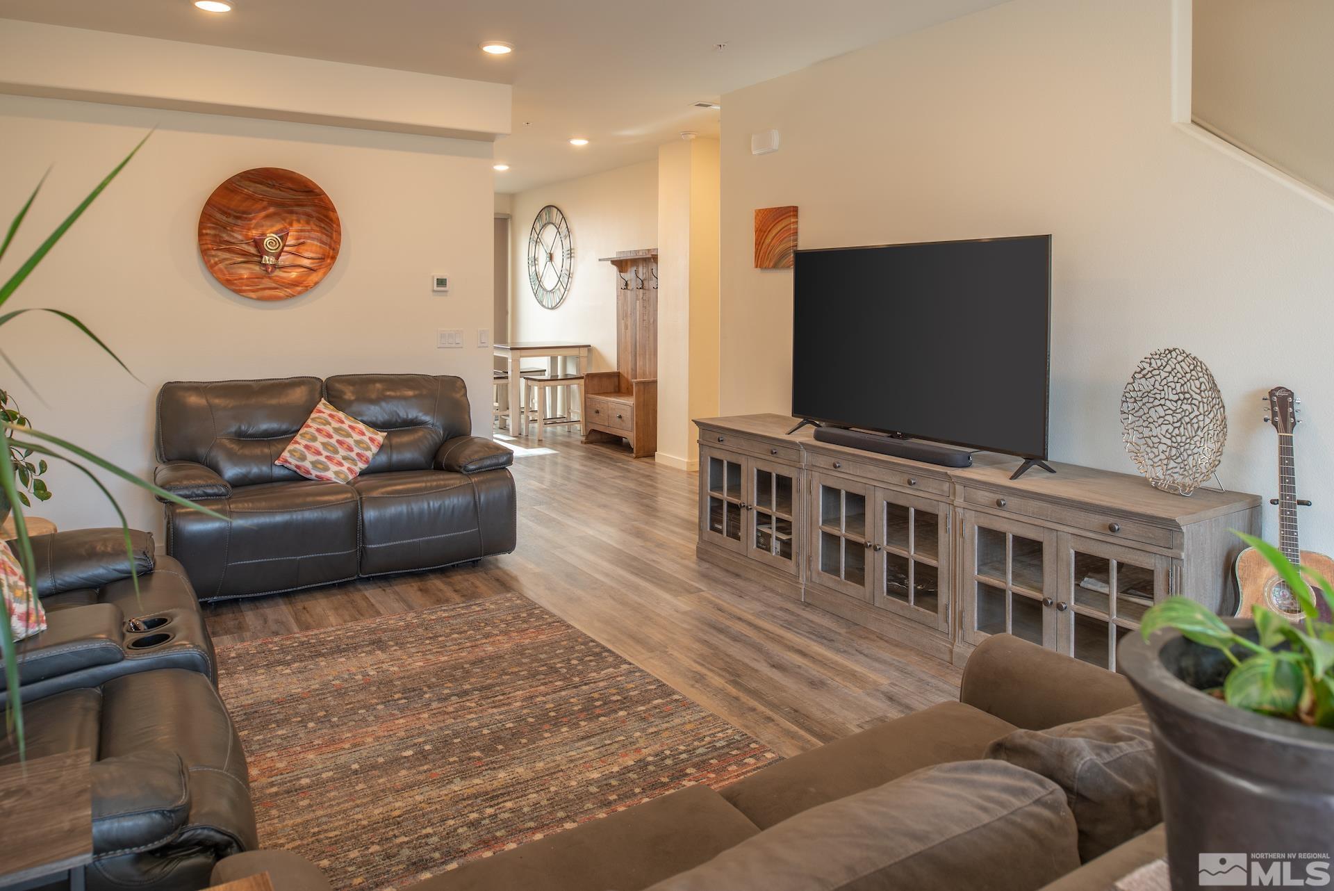 575 Logan Jacob Lane Reno, NV 89503 - Photo 6 of 31 a living room with furniture and a flat screen tv