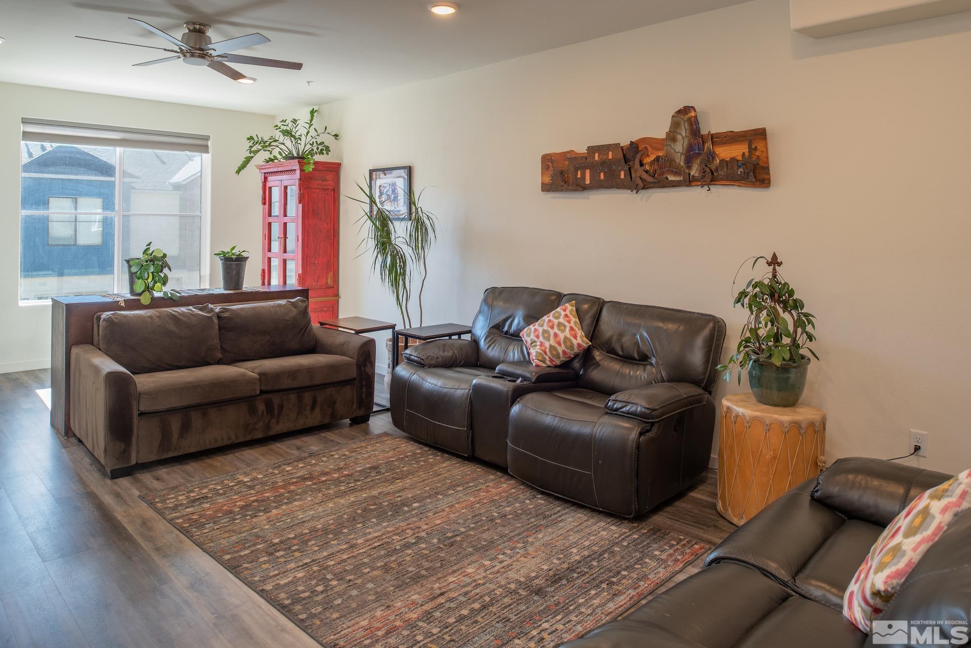 575 Logan Jacob Lane Reno, NV 89503 - Photo 7 of 31 a living room with furniture and a couch