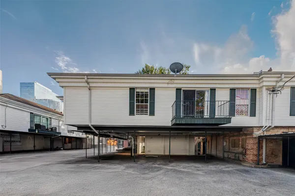 a view of a house with a balcony