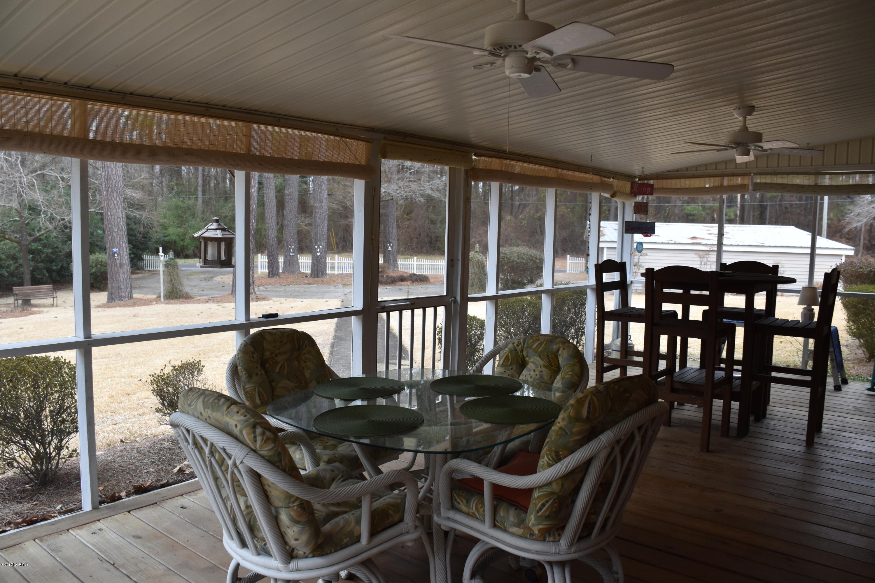109 Ridgewood Circle Washington, NC 27889 - Photo 17 of 49 Screened In Back Porch