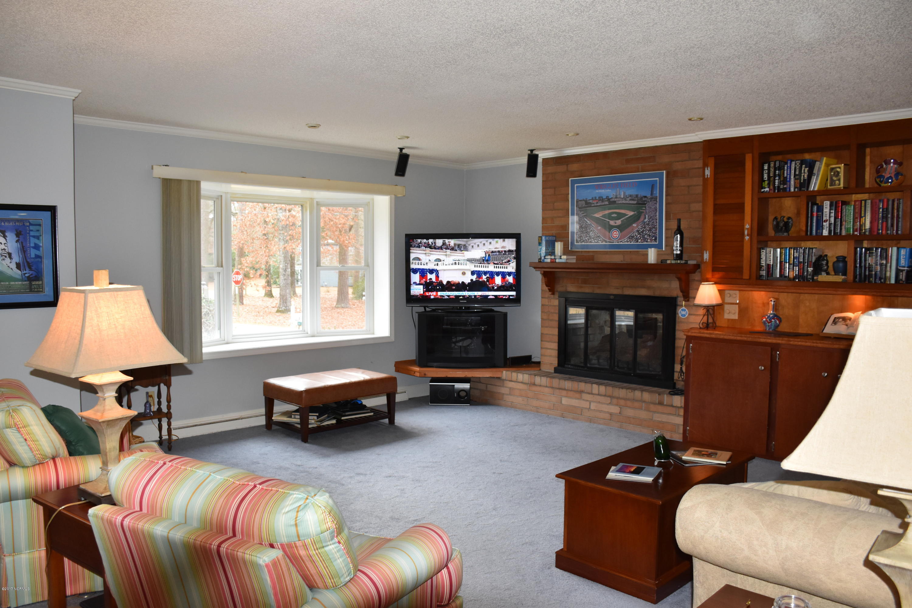 109 Ridgewood Circle Washington, NC 27889 - Photo 23 of 49 Fireplace and Built-In Bookshelf