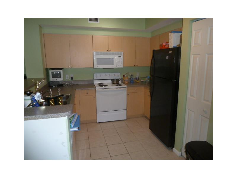 8060 North Nob Hill Road, Unit 305 Tamarac, FL 33321 - Photo 7 of 15 Kitchen