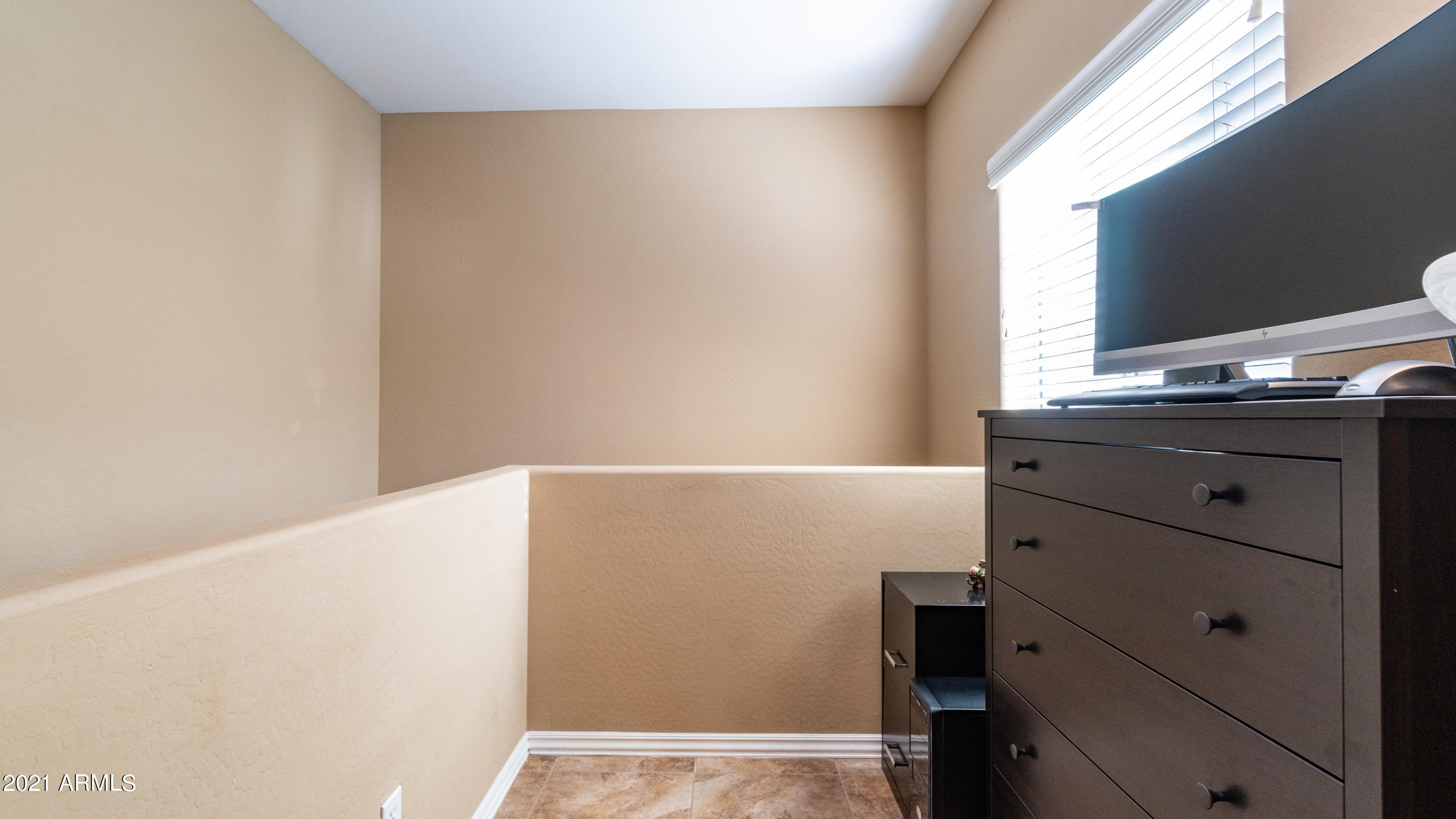 3935 East Rough Rider Road, Unit 1228 Phoenix, AZ 85050 - Photo 7 of 62 Bonus Space at the Top of the Stairs
