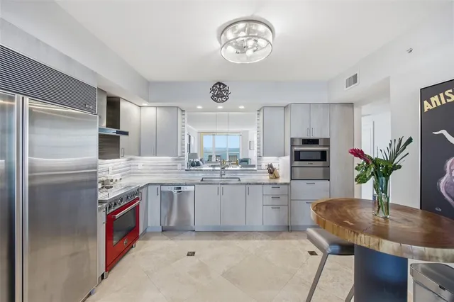 a room with gym equipment and a large window