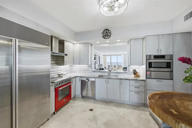 a view of a very nice looking living room with a rug