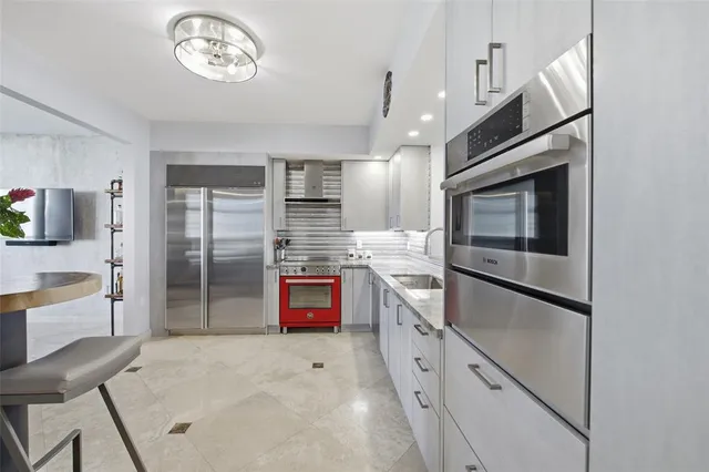 a view of a swimming pool with a lounge chairs