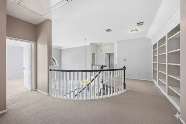 a view of a hallway with closet