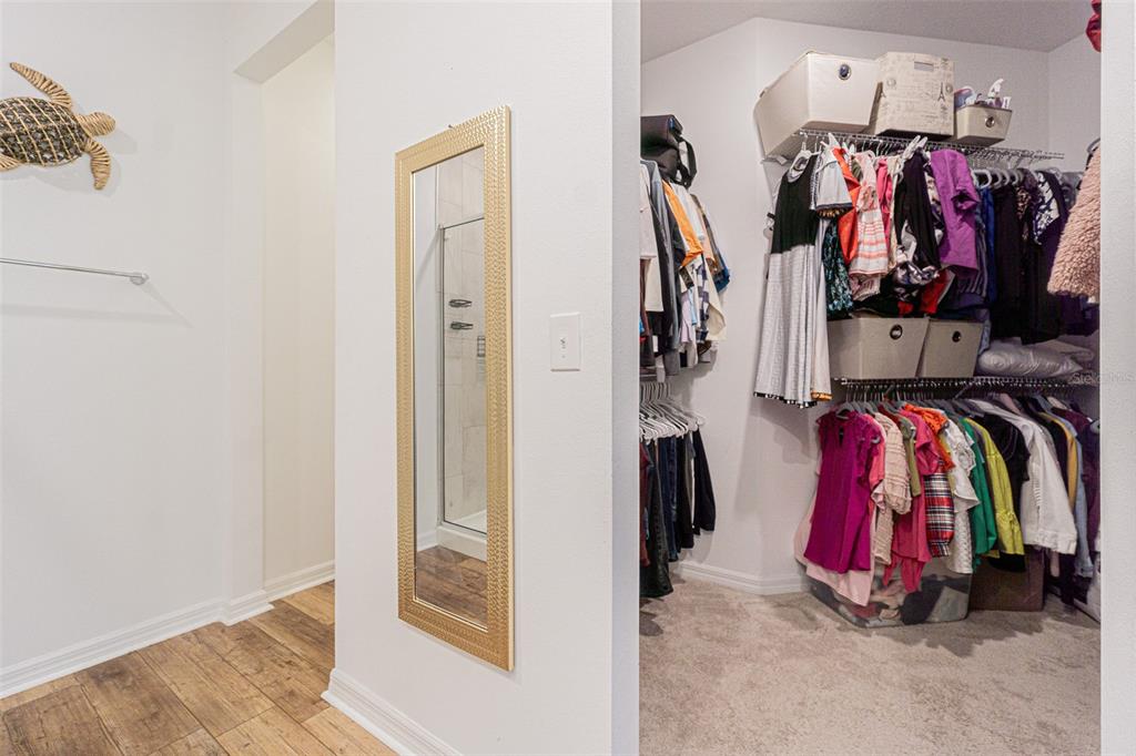 5265 Cricket Hill Road Brooksville, FL 34602 - Photo 20 of 30 a view of walk in closet with clothes