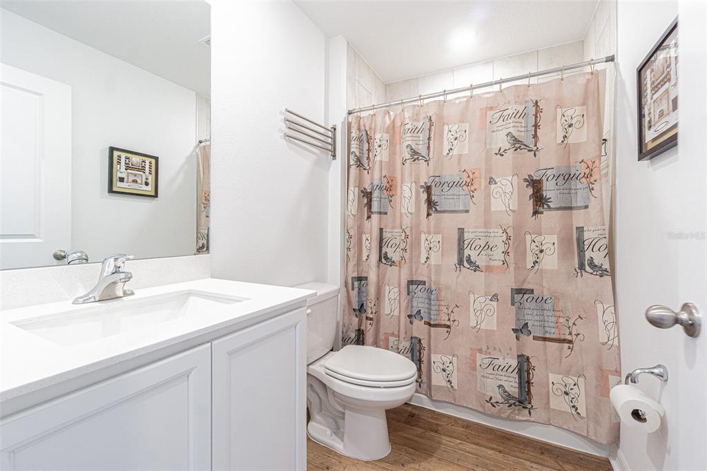5265 Cricket Hill Road Brooksville, FL 34602 - Photo 28 of 30 a bathroom with a sink a toilet and shower