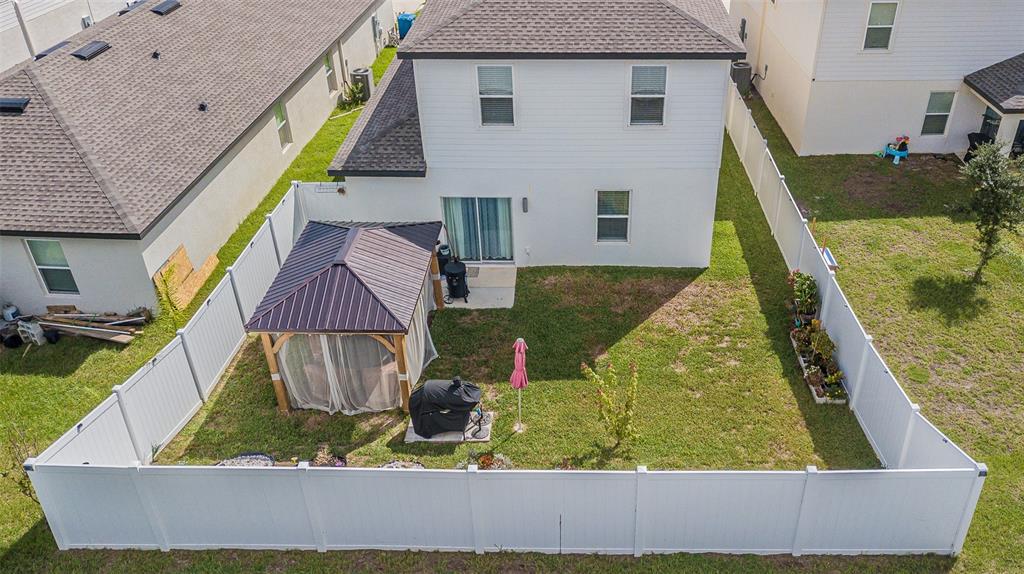 5265 Cricket Hill Road Brooksville, FL 34602 - Photo 5 of 30 an aerial view of residential house with outdoor space