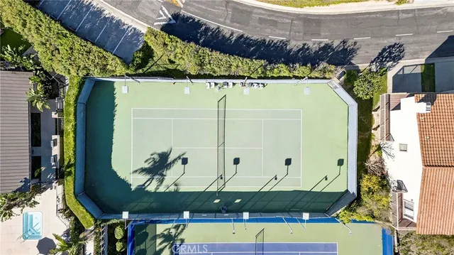 a view of a swimming pool with an outdoor seating