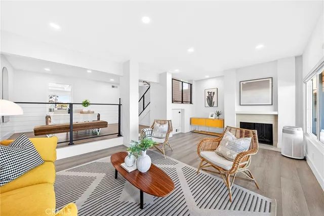 a living room with furniture or couch and a fireplace