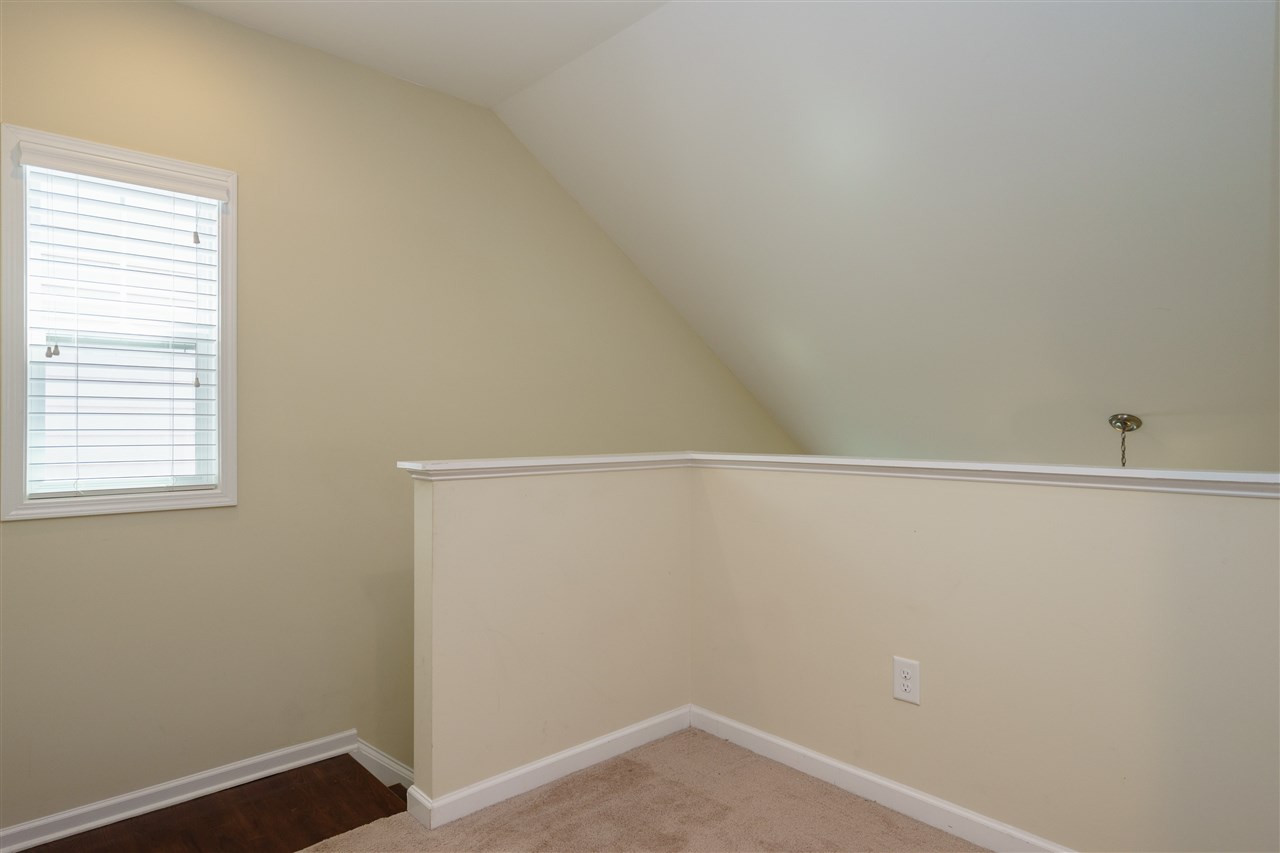 5622 Wade Park Boulevard Raleigh, NC 27607 - Photo 15 of 25 LANDING AREA IN UPSTAIRS OF HOME---PERFECT NOOK FOR PLANTS AND/OR A COZY READING CHAIR! LANDING