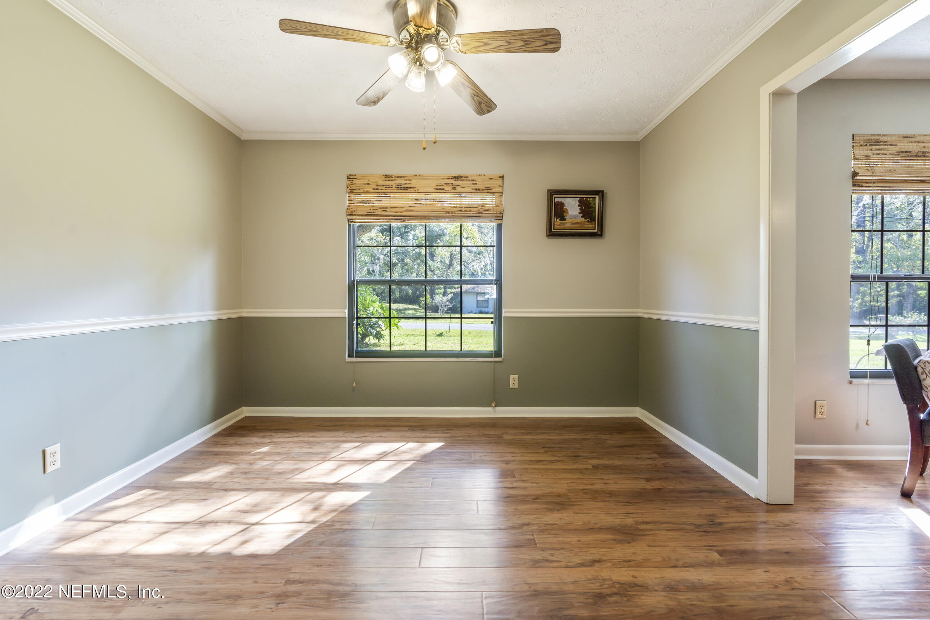 4208 Cedar Road Orange Park, FL 32065 - Photo 14 of 37 wooden floor in an empty room with a window