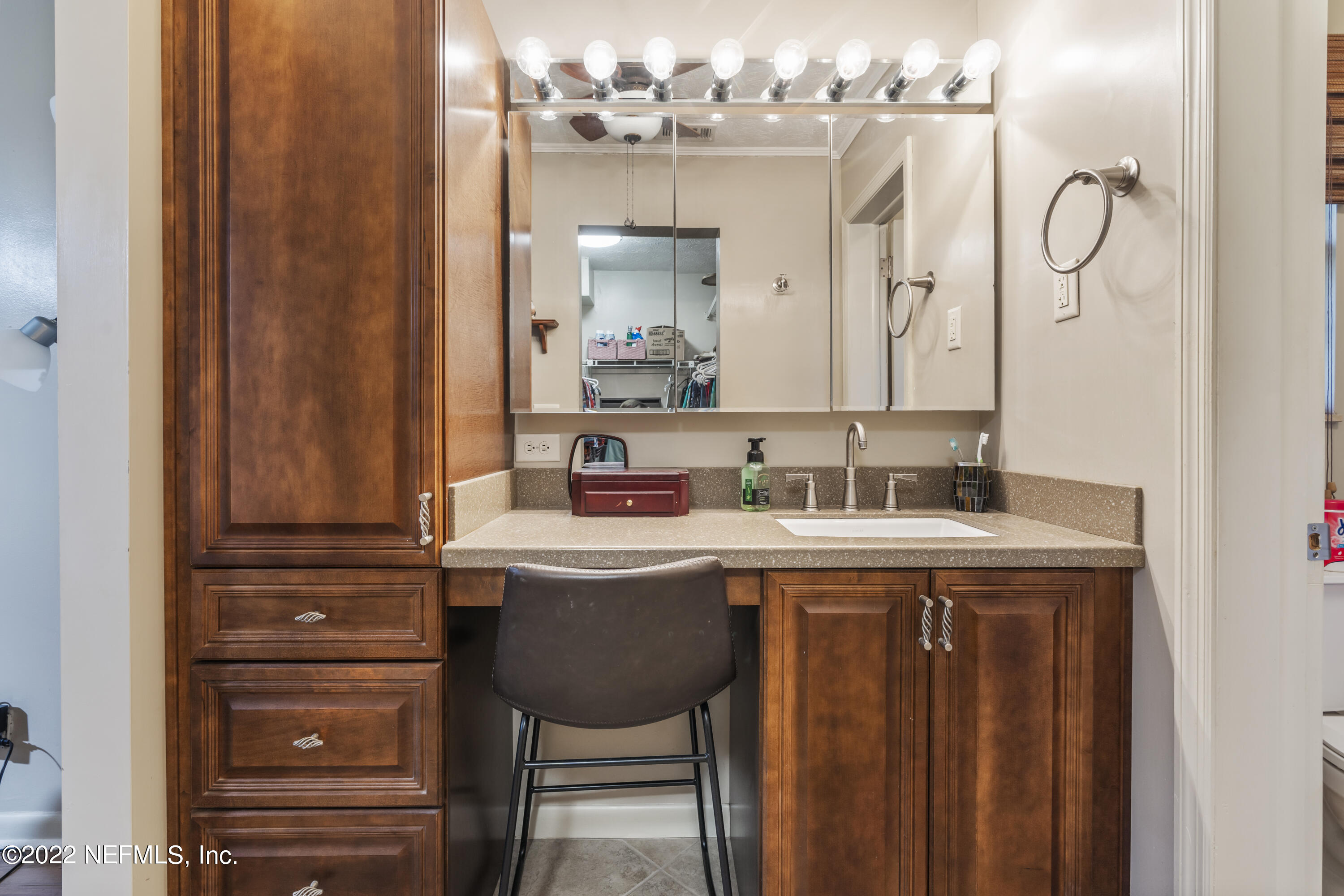 4208 Cedar Road Orange Park, FL 32065 - Photo 19 of 37 a bathroom with a sink and a mirror