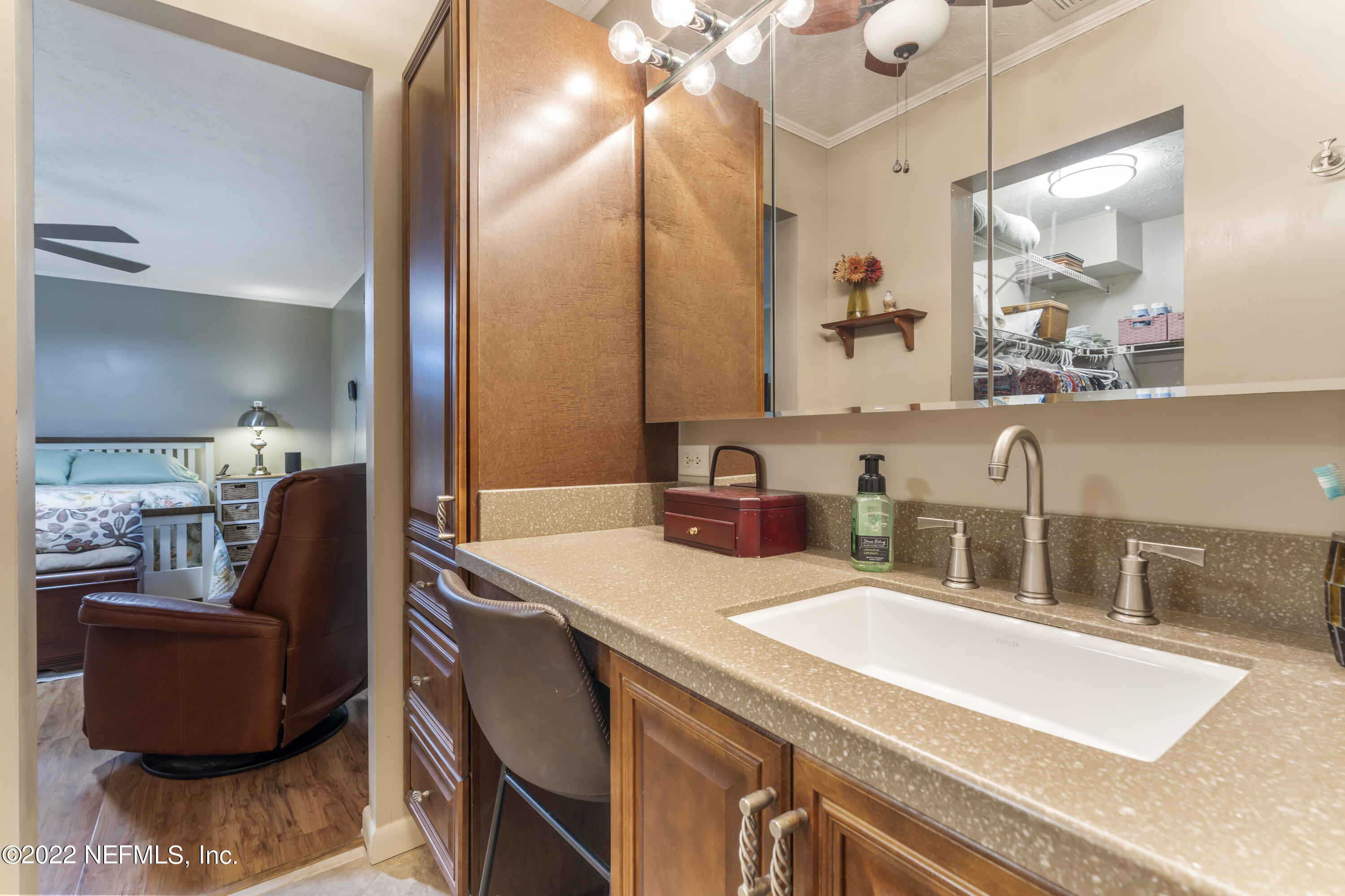 4208 Cedar Road Orange Park, FL 32065 - Photo 21 of 37 a bathroom with a double vanity sink and a mirror