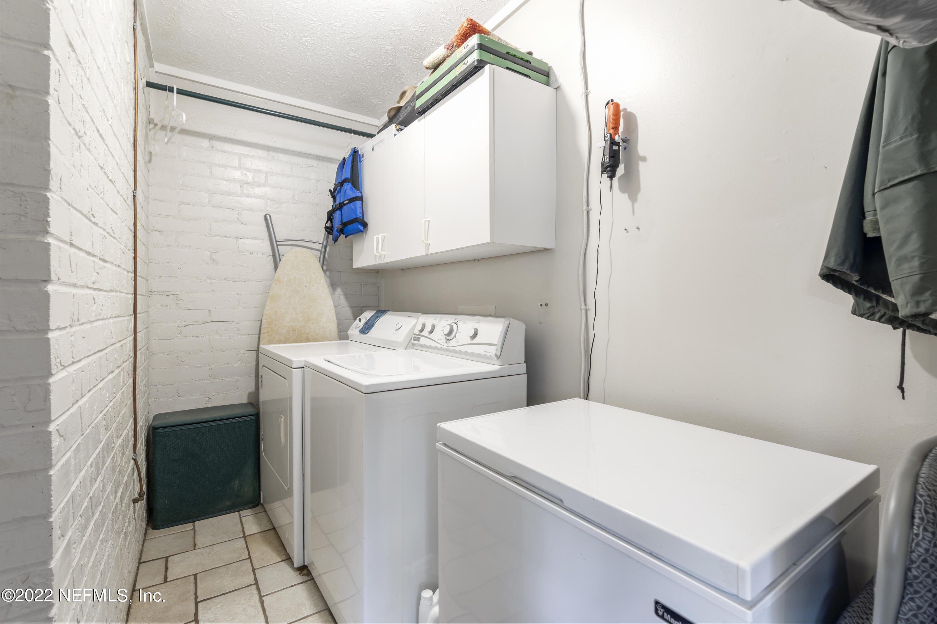 4208 Cedar Road Orange Park, FL 32065 - Photo 26 of 37 a utility room with dryer and washer
