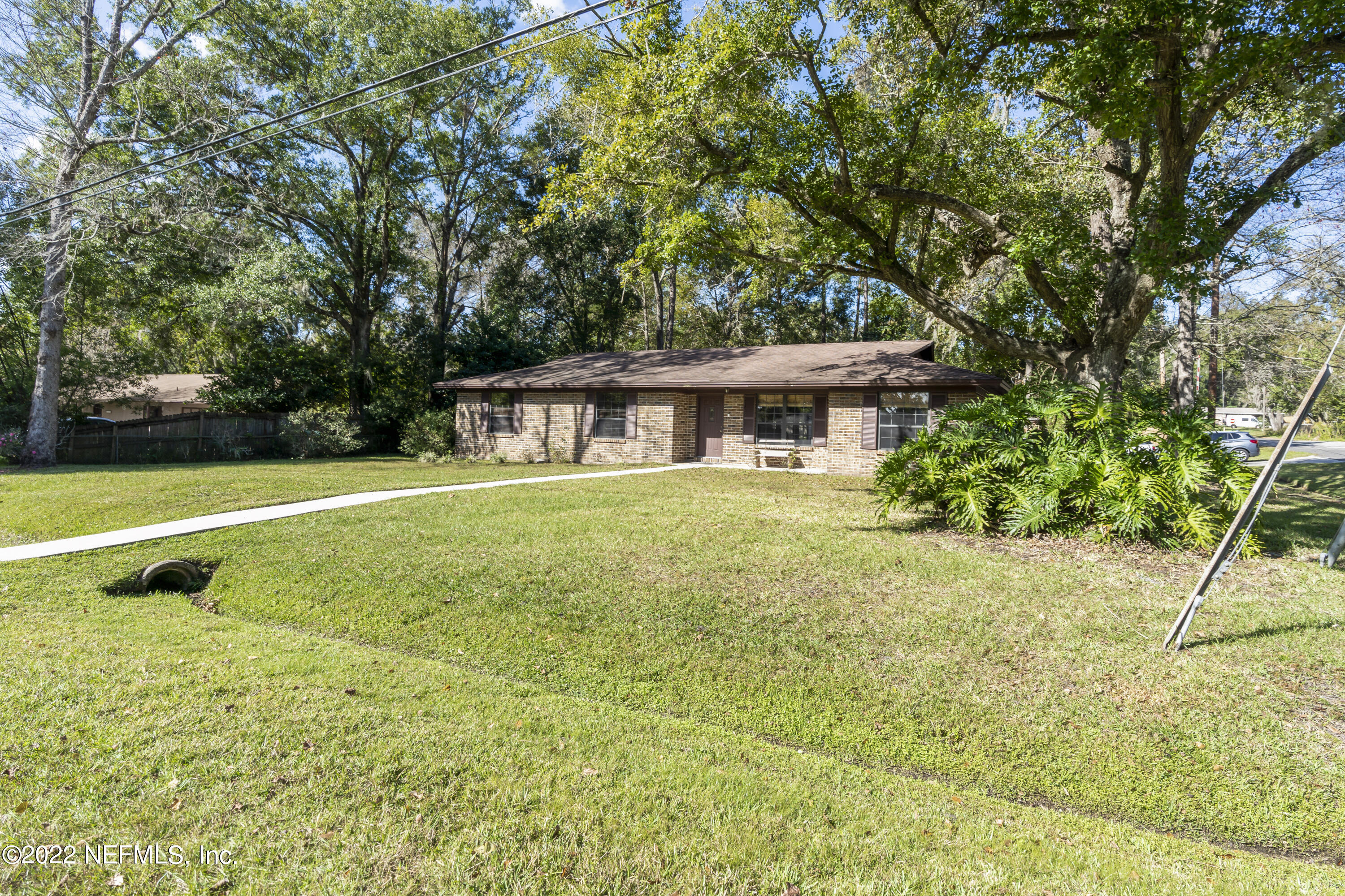 4208 Cedar Road Orange Park, FL 32065 - Photo 3 of 37 a view of a house with a backyard