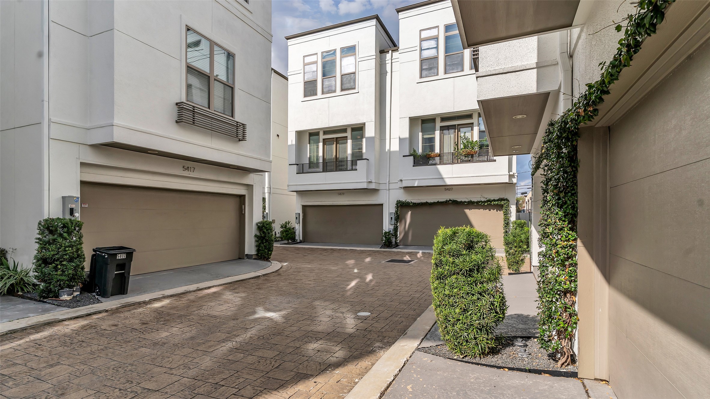 a front view of a building with a garage