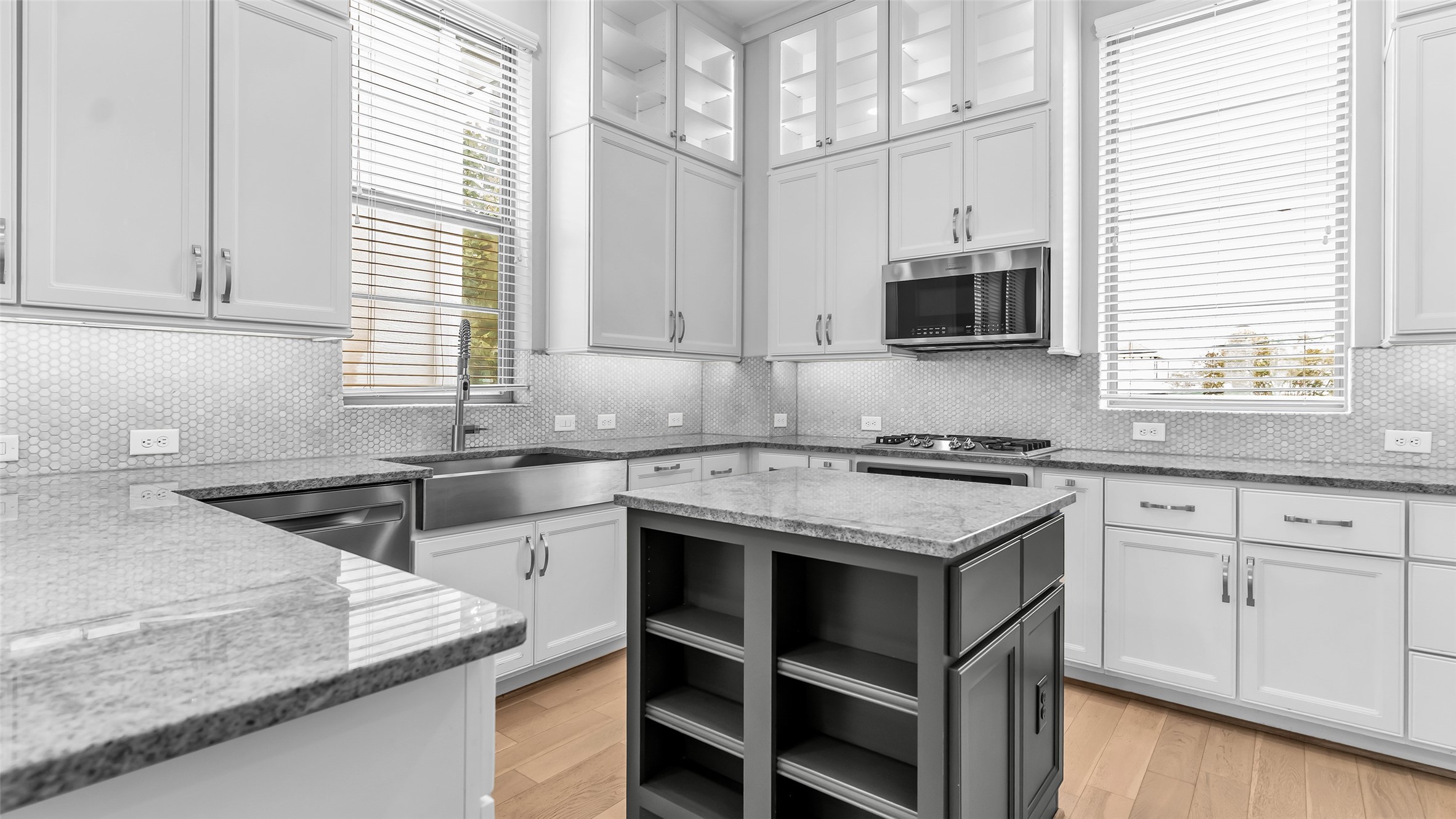 5429 Larkin Street Houston, TX 77007 - Photo 20 of 47 a kitchen with stainless steel appliances granite countertop a sink stove and microwave