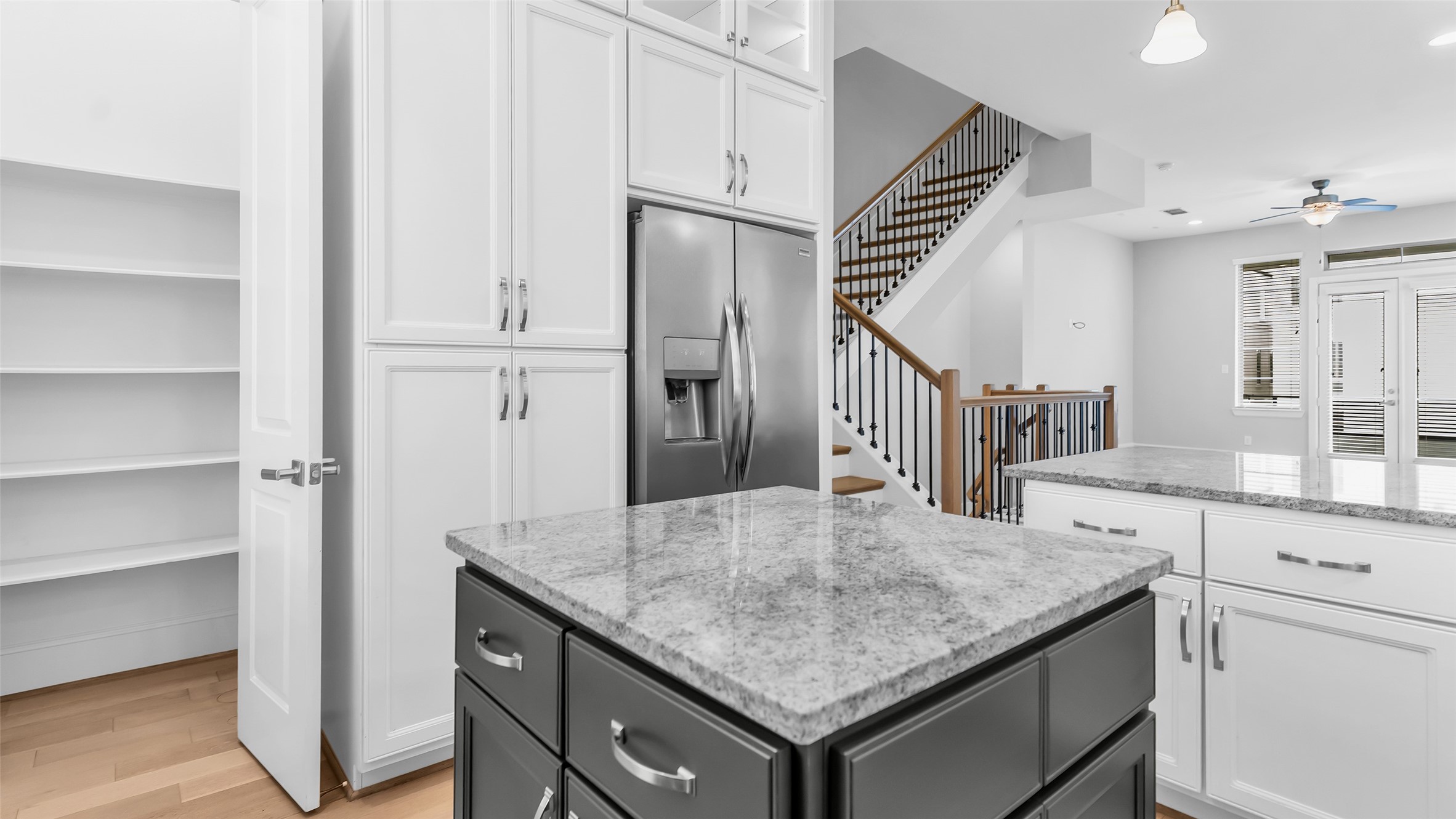 5429 Larkin Street Houston, TX 77007 - Photo 21 of 47 a kitchen with a table chairs and cabinets