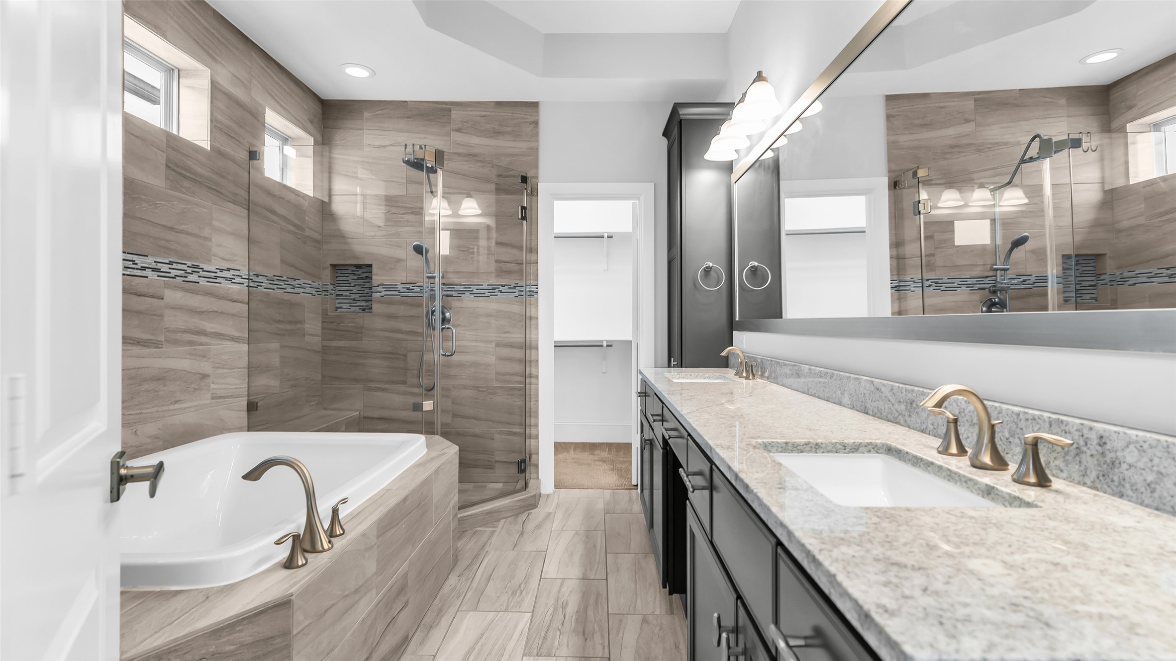 5429 Larkin Street Houston, TX 77007 - Photo 37 of 47 a bathroom with a granite countertop tub sink and mirror