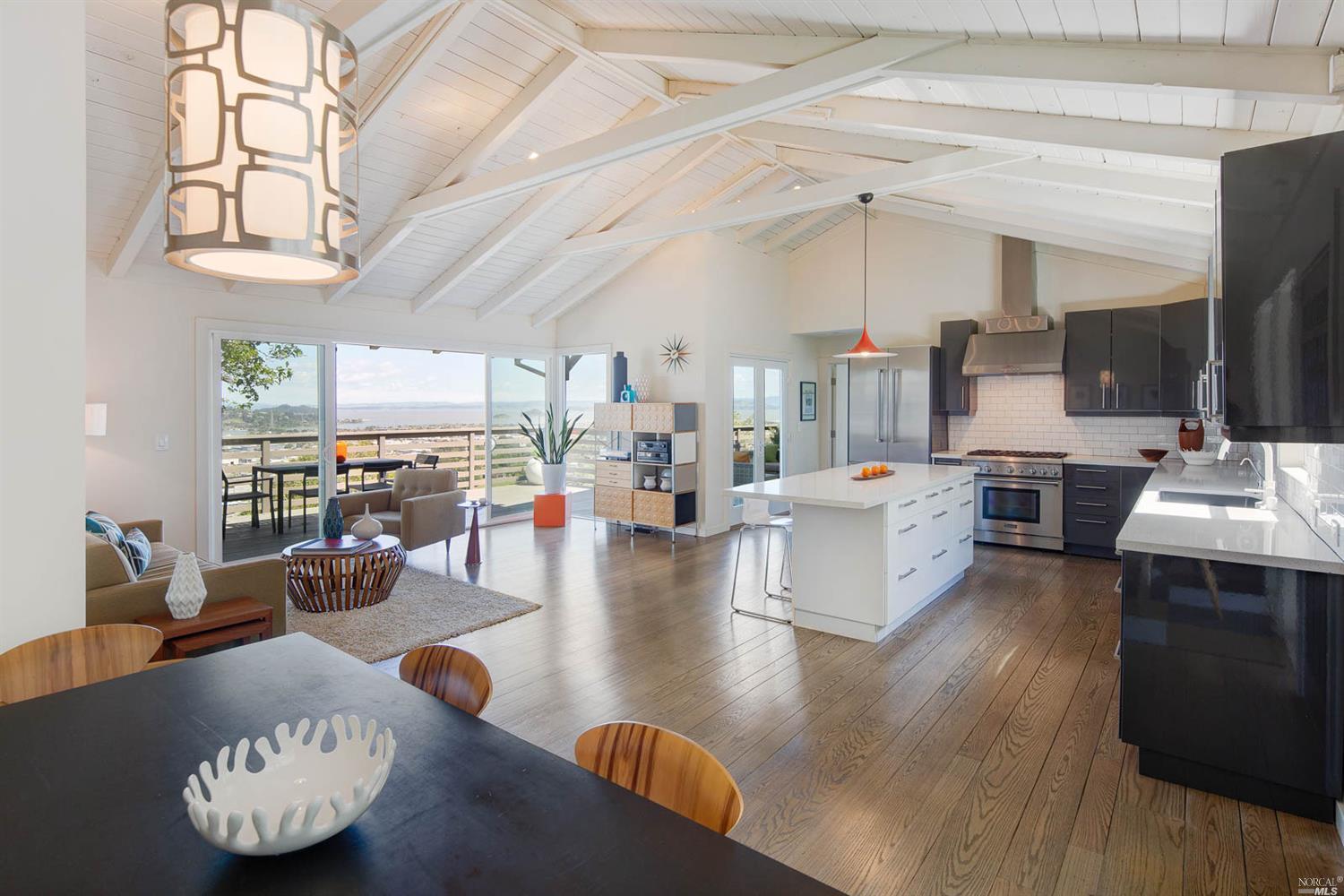 466 Bret Harte Road San Rafael, CA 94901 - Photo 1 of 1 a living room with lots of furniture and kitchen view
